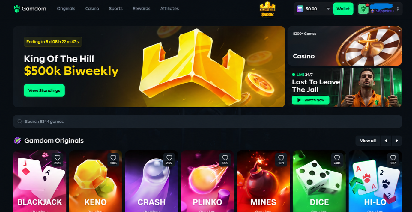 Concept of the Gamdom homepage with a Last To Leave The Jail tile marked LIVE 24/7 next to the King of the Hill banner